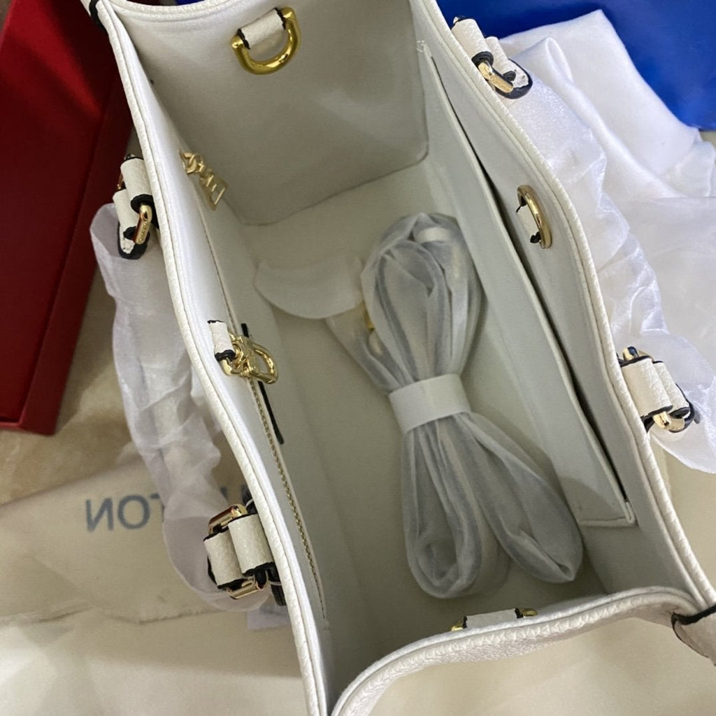 LOUIS VUITTON ONTHEGO PM 25 CREAM EMBOSSED GRAINED COWHIDE LEATHER