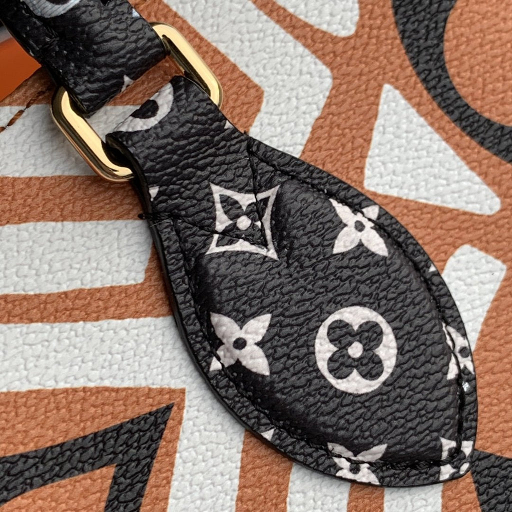 LOUIS VUITTON CRAFTY ONTHEGO GM 41 CARAMEL AND CREAM MONOGRAM GIANT CANVAS