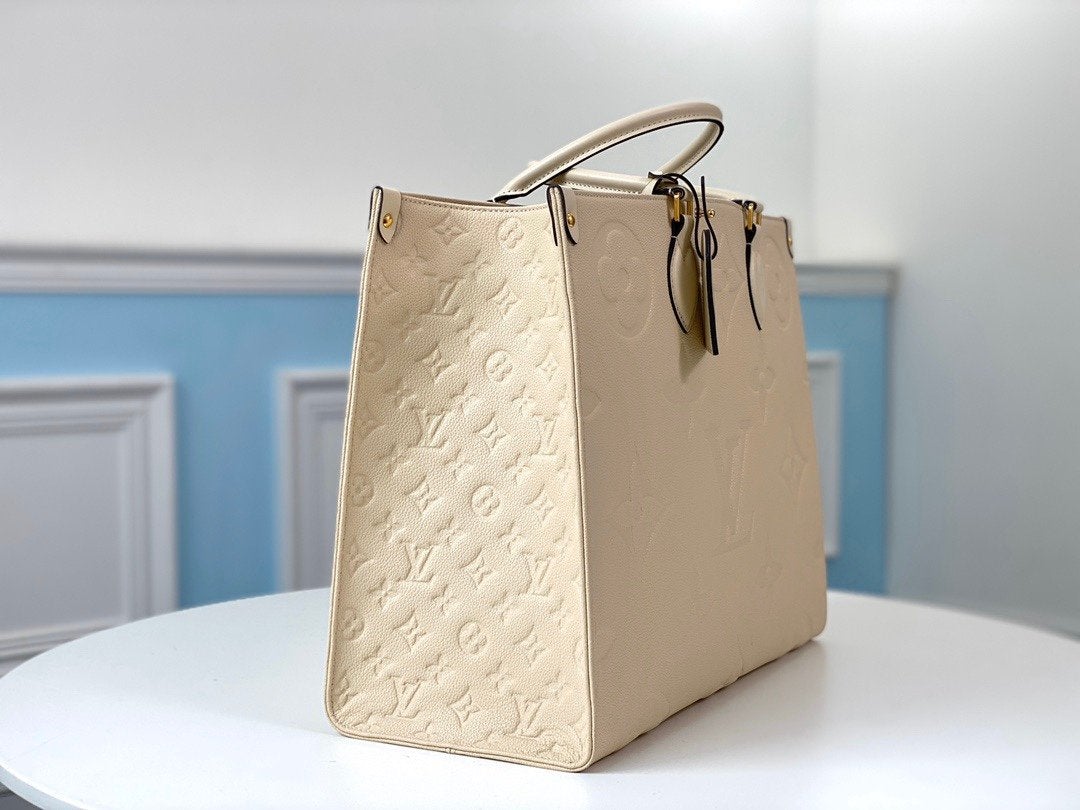 LOUIS VUITTON ONTHEGO GM 41 CREAM MONOGRAM EMPREINTE GIANT CANVAS