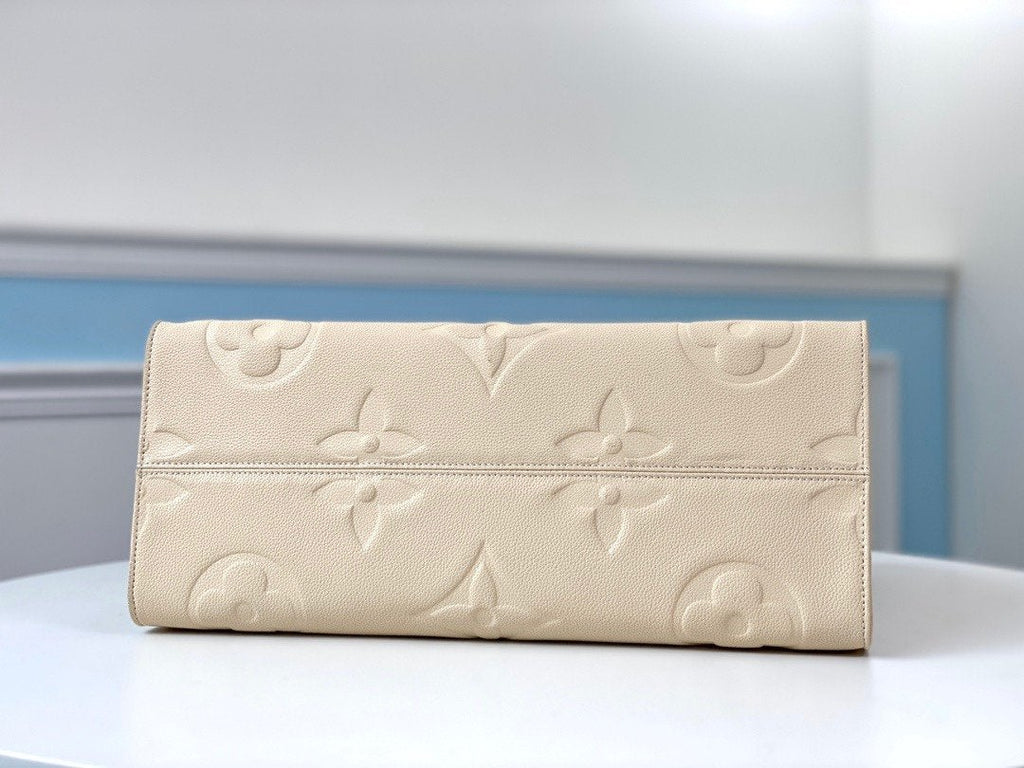 LOUIS VUITTON ONTHEGO GM 41 CREAM MONOGRAM EMPREINTE GIANT CANVAS