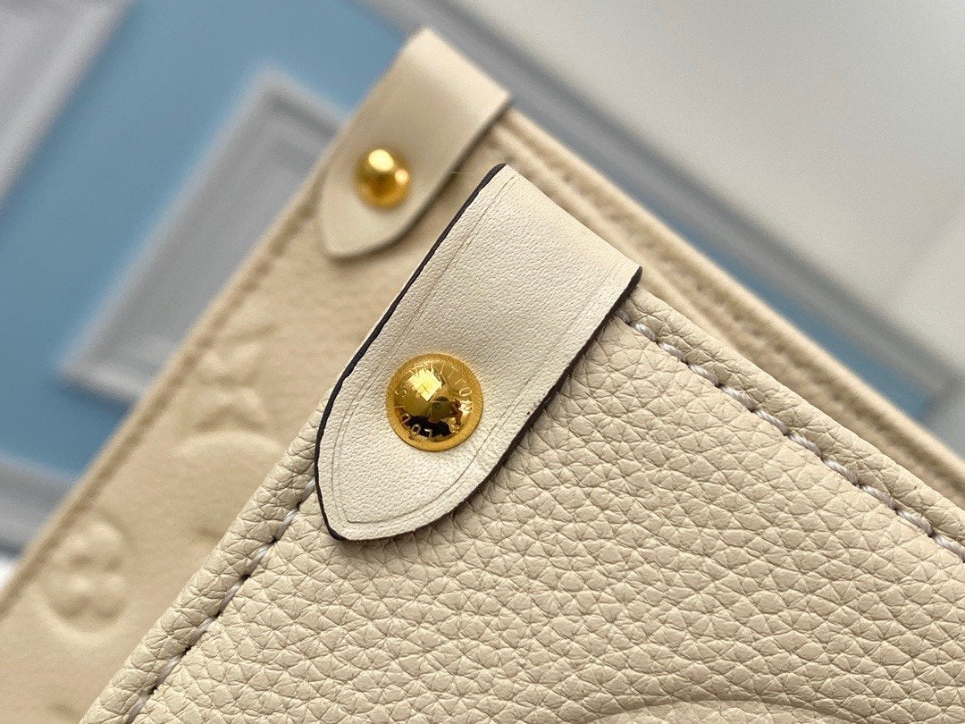 LOUIS VUITTON ONTHEGO GM 41 CREAM MONOGRAM EMPREINTE GIANT CANVAS