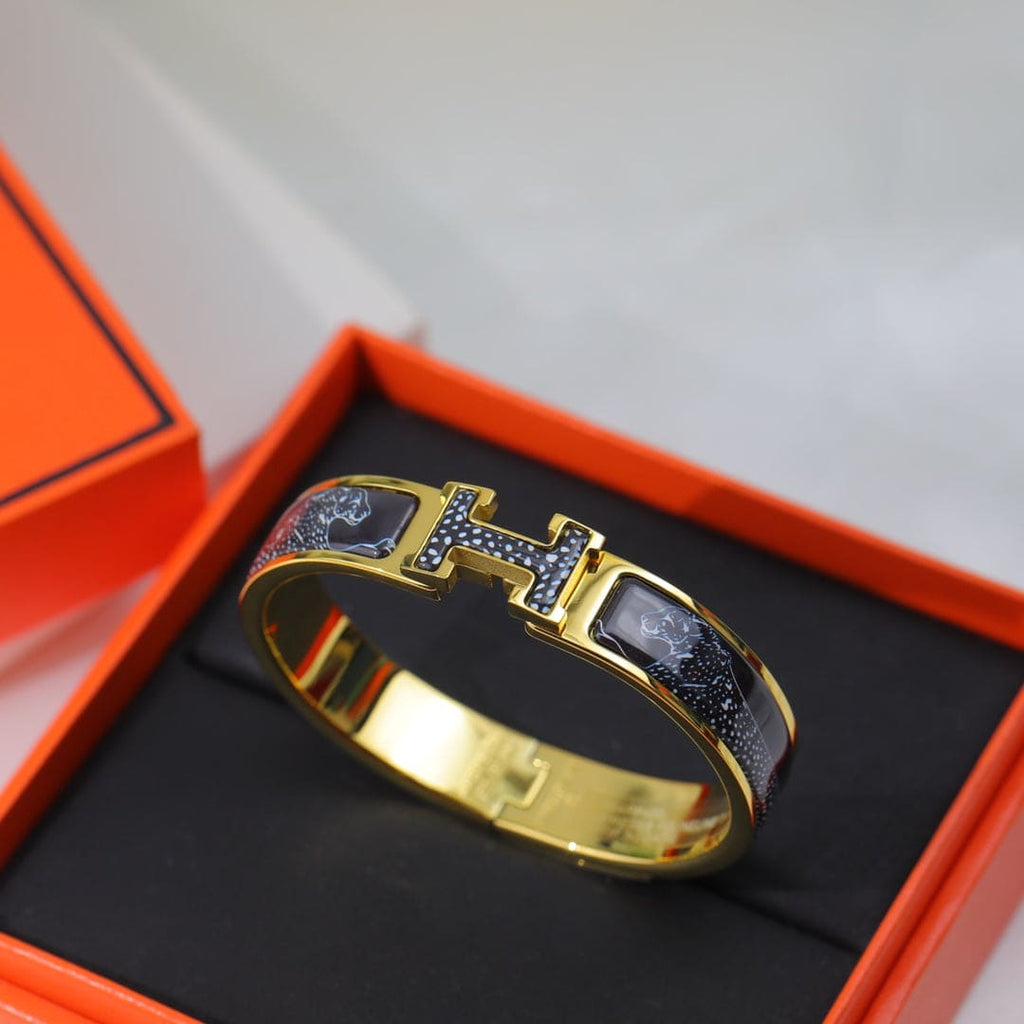 18K Guepards Clic Clac Hermes Bracelet
