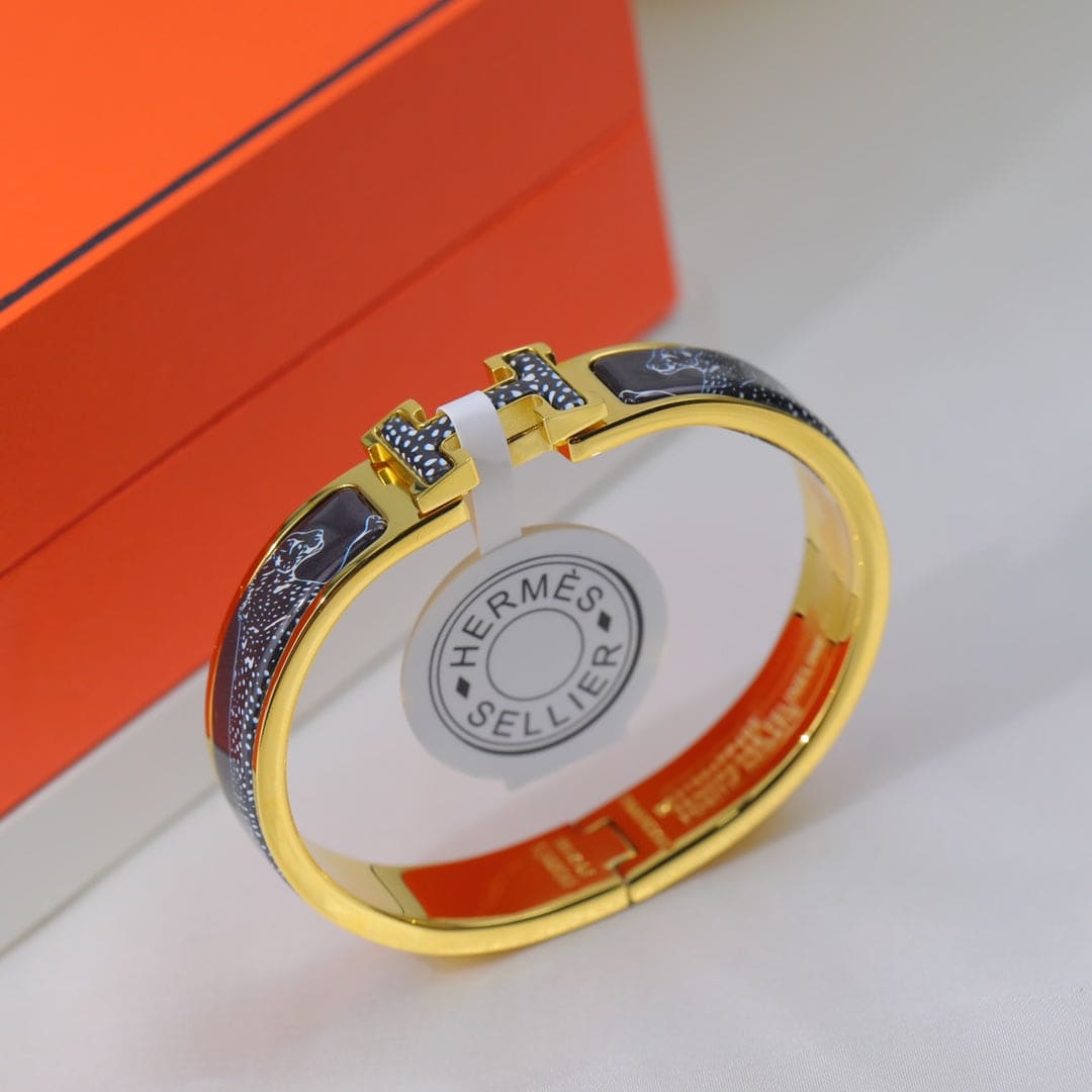 18K Guepards Clic Clac Hermes Bracelet