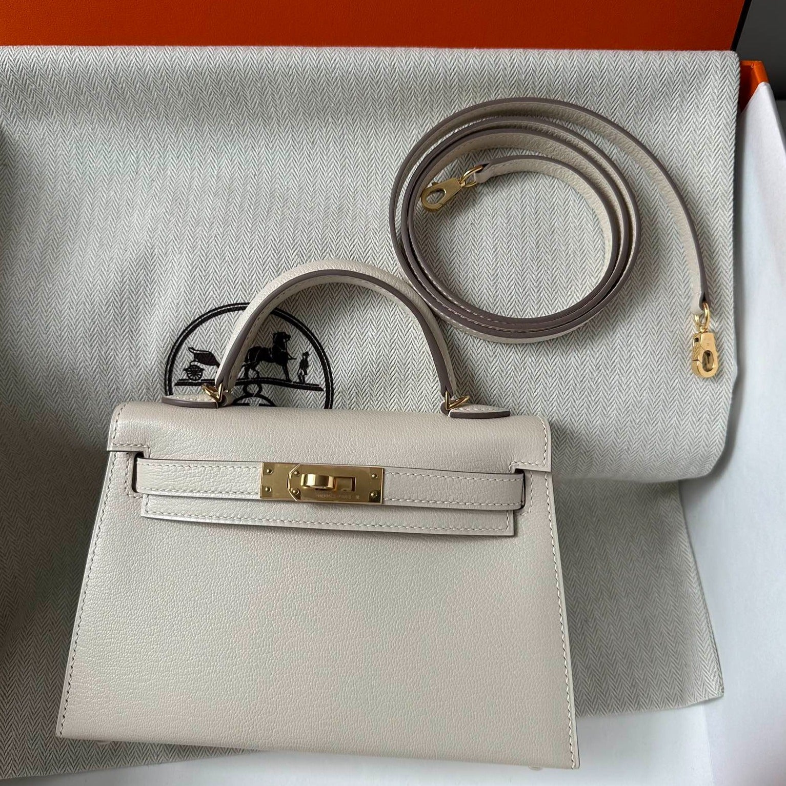 HERMES KELLY MINI 20 WHITE CHEVRE GOLD HARDWARE