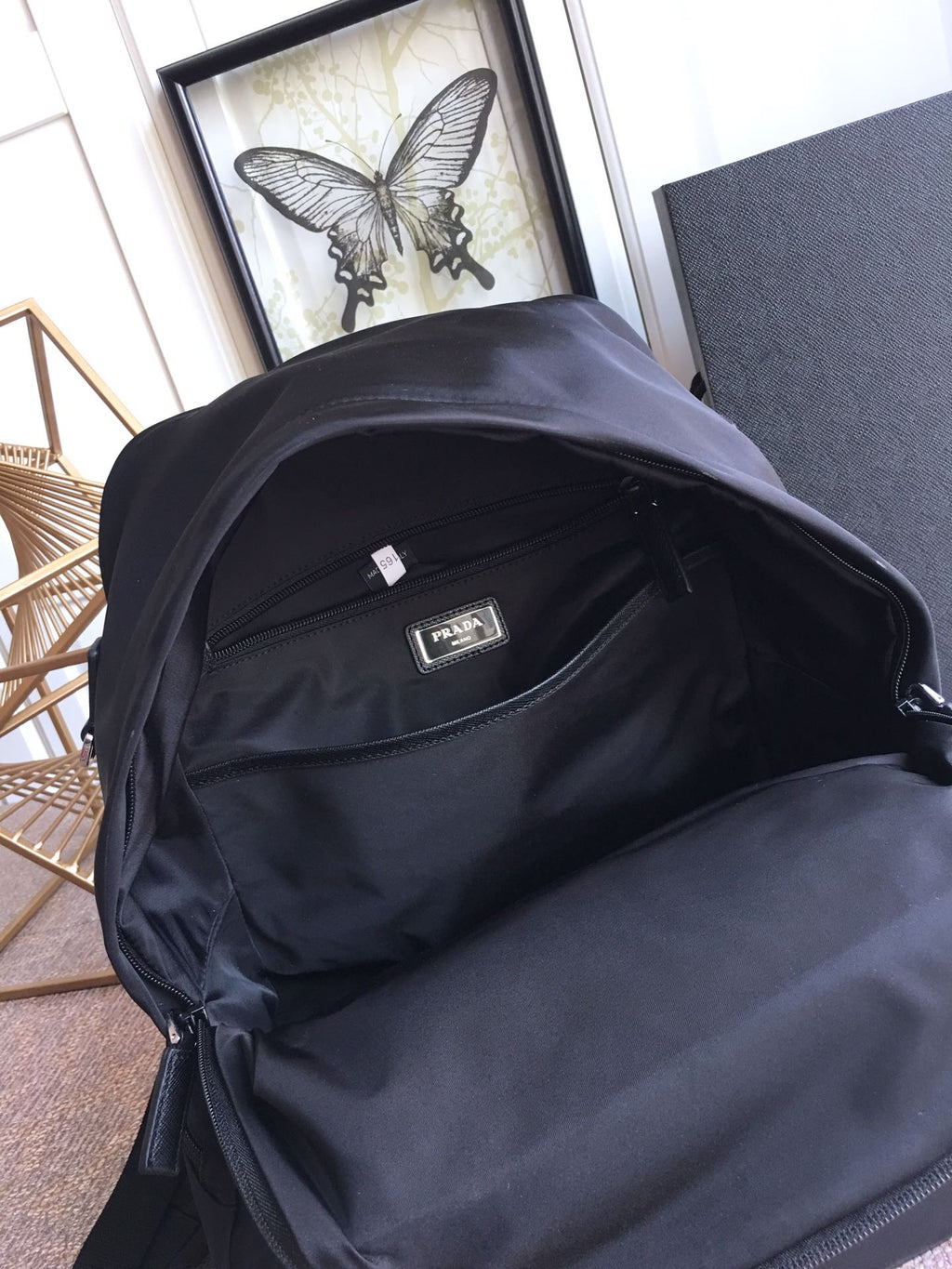 PRADA TRIANGLE LOGO BACKPACK 40 IN BLACK RE-NYLON
