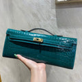 HERMES KELLY CUT 31 IN PINE GREEN SHINNY ALLIGATOR LEATHER WITH GOLD HARDWARE