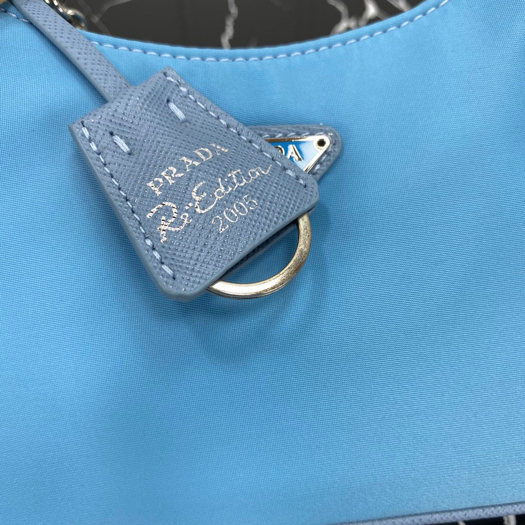 PRADA HOBO 22 BAG IN SAPPHIRE BLUE RE-NYLON