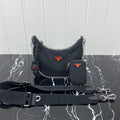PRADA HOBO 22 BAG IN BLACK RE-NYLON WITH RED LOGO
