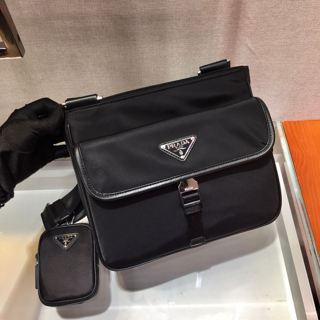 PRADA TRIANGLE LOGO CROSSBODY BAG 25 IN BLACK RE-NYLON AND SAFFIANO LEATHER TRIM