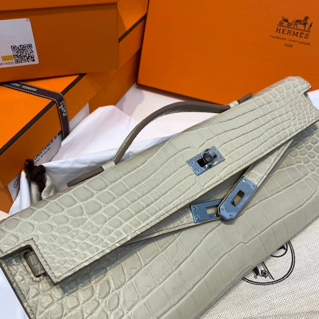 HERMES KELLY CUT 31 IN PEARL GRAY ALLIGATOR LEATHER WITH SILVER HARDWARE