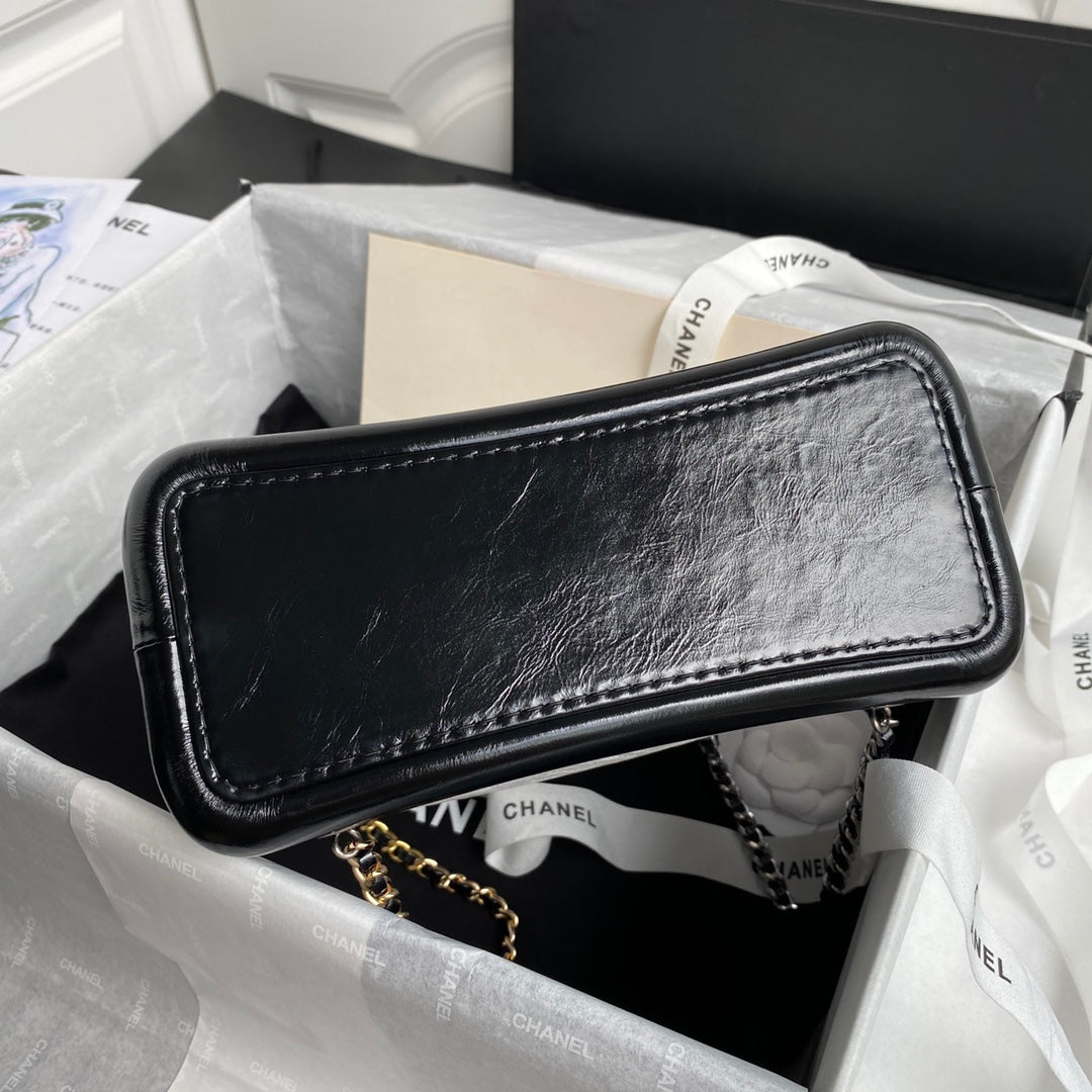 CHANEL GRABRIELLE SMALL 24 BACKPACK IN WHITE MIX BLACK CALFSKIN