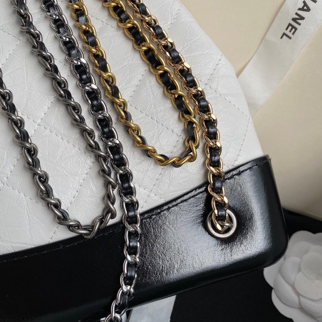 CHANEL GRABRIELLE SMALL 24 BACKPACK IN WHITE MIX BLACK CALFSKIN