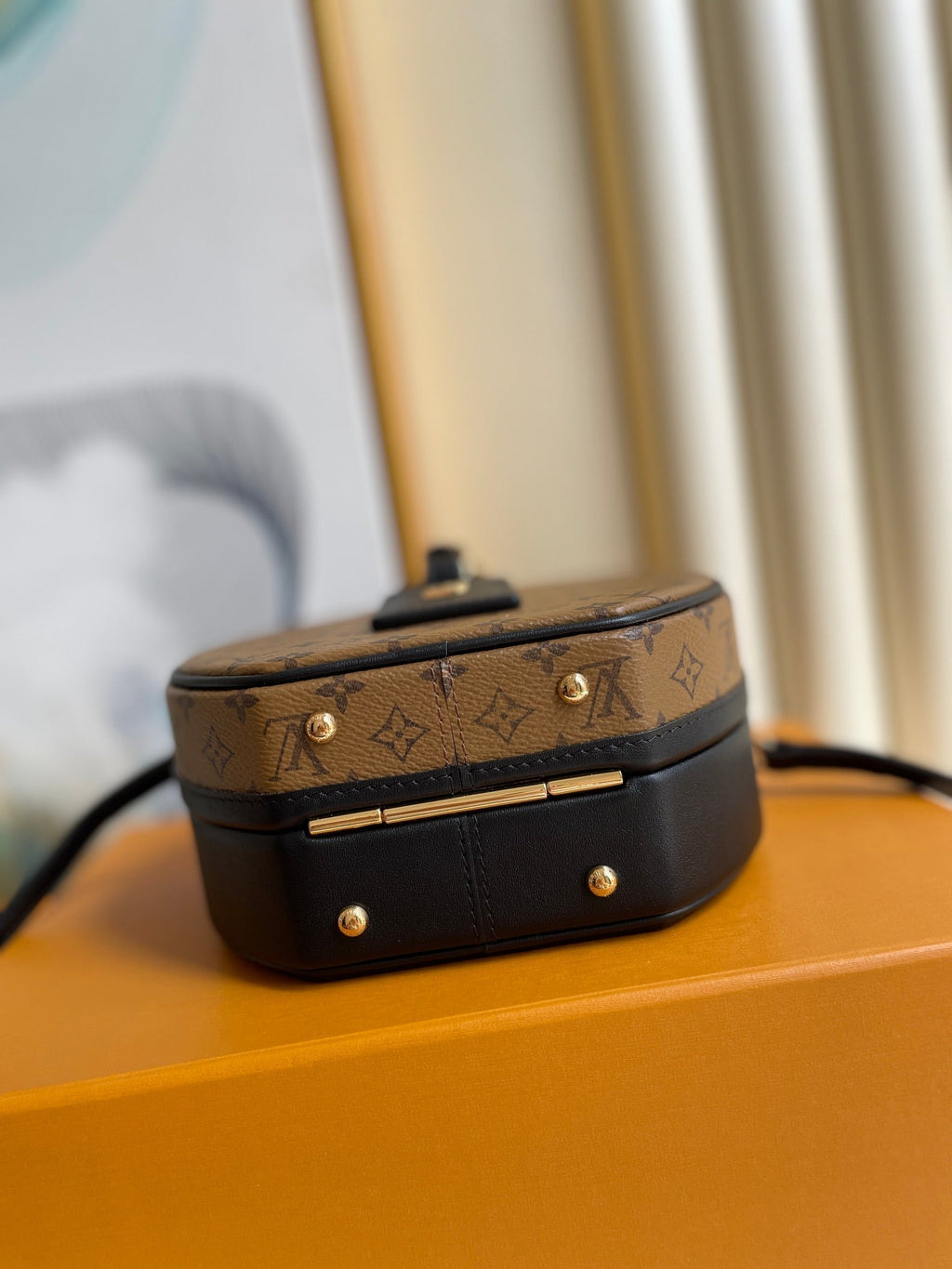 LOUIS VUITTON LV 25S PETITE BOITE CHAPEAU 17 IN BLACK MONOGRAM REVERSE CALFSKIN