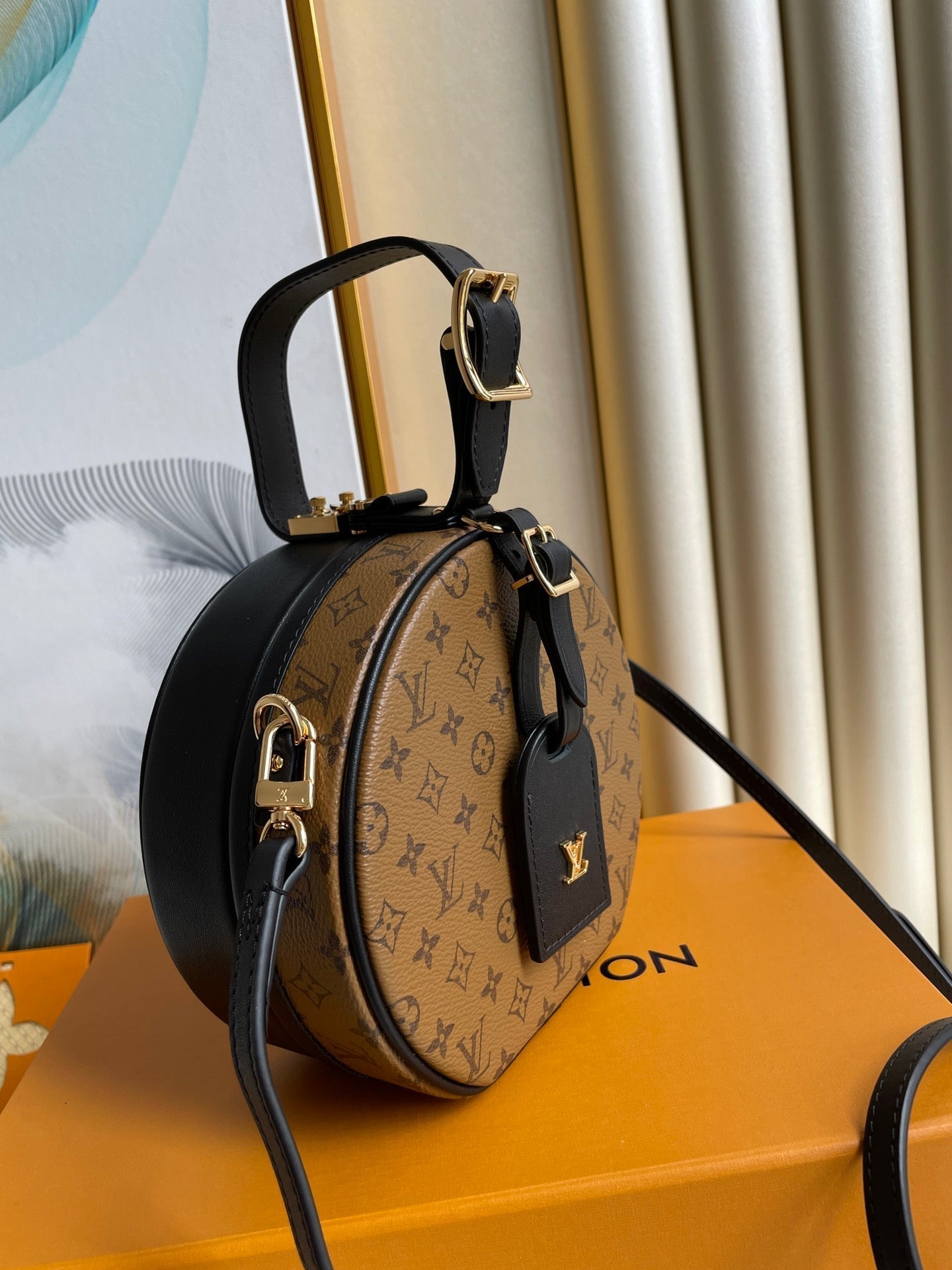 LOUIS VUITTON LV 25S PETITE BOITE CHAPEAU 17 IN BLACK MONOGRAM REVERSE CALFSKIN
