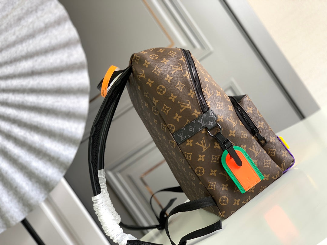 LOUIS VUITTON DISCOVERY BACKPACK 40 IN BROWN MONOGRAM CANVAS RUBBER LOGO