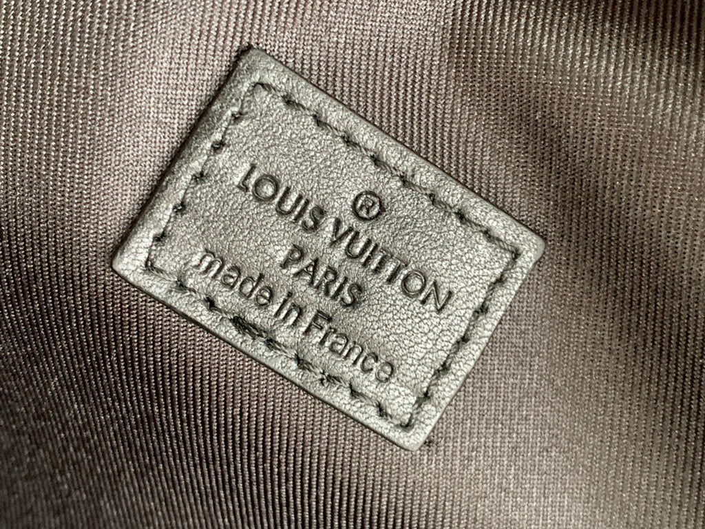 LOUIS VUITTON DISCOVERY BACKPACK 40 IN BROWN MONOGRAM CANVAS RUBBER LOGO
