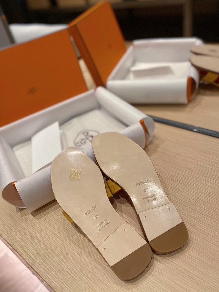 HERMES 0RAN SANDALS IN DIJON YELLOW SUEDE AND DEEP PINK CALFSKIN