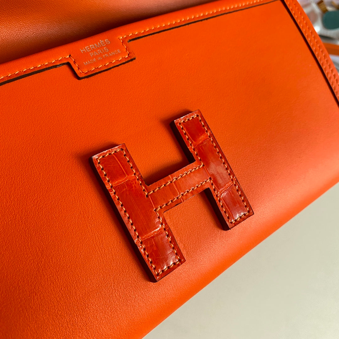 HERMES JIGE ELAN 29 CLUTCH IN BRIGHT ORANGE CALFSKIN WITH LIZARD SKIN