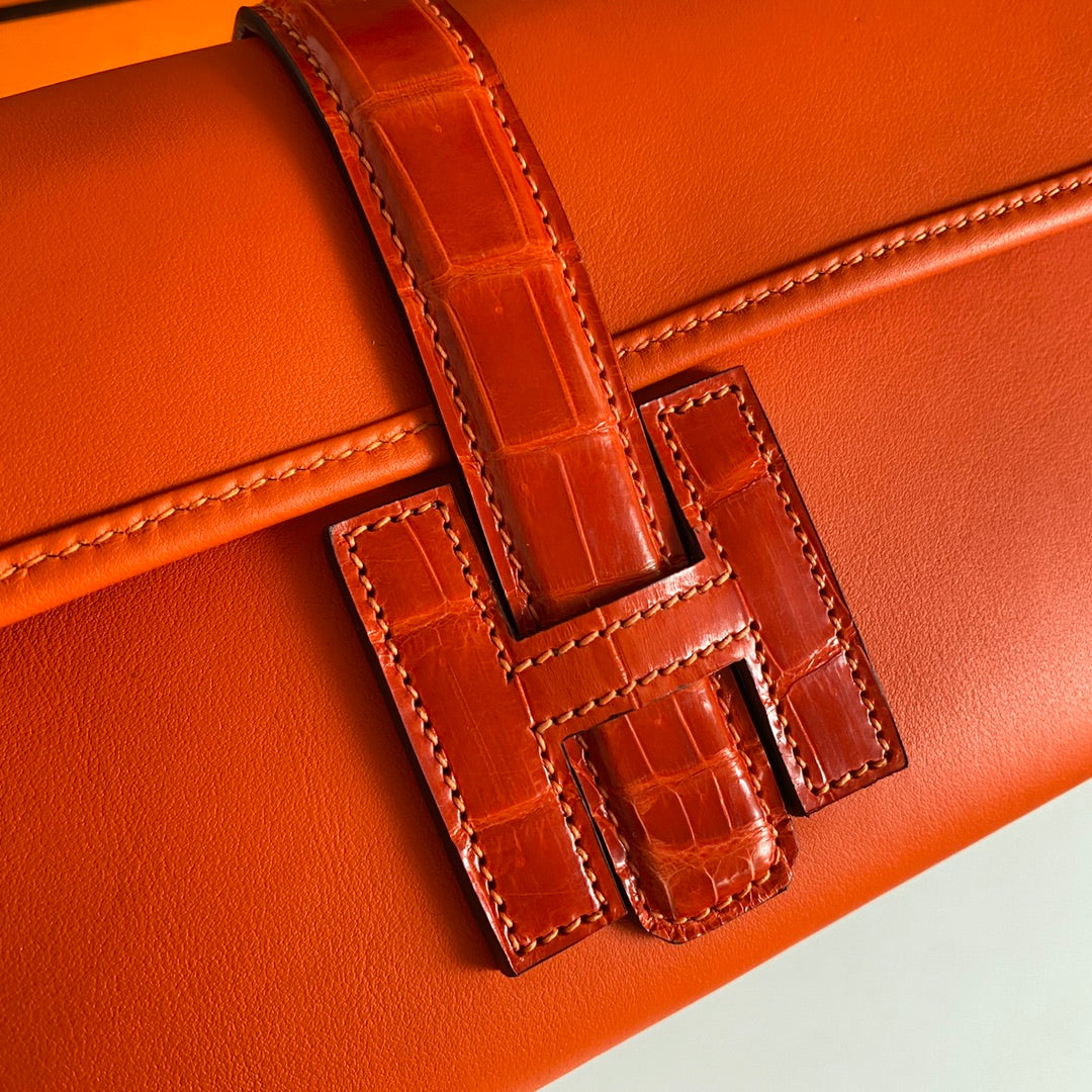HERMES JIGE ELAN 29 CLUTCH IN BRIGHT ORANGE CALFSKIN WITH LIZARD SKIN