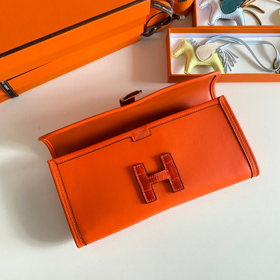 HERMES JIGE ELAN 29 CLUTCH IN BRIGHT ORANGE CALFSKIN WITH LIZARD SKIN