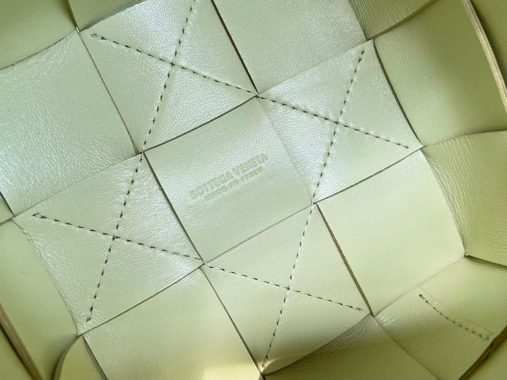 BOTTEGA VENETA SMALL CASSETTE BUCKET 18 IN PASTEL YELLOW CALFSKIN
