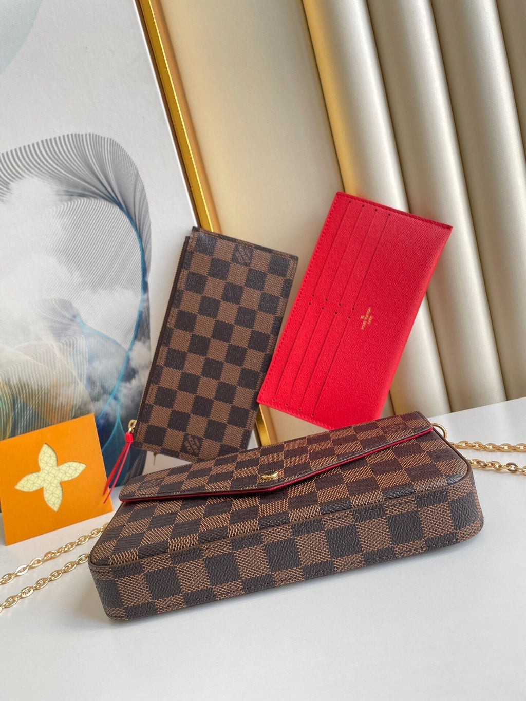 LOUIS VUITTON FÉLICIE POCHETTE 21 IN BROWN DAMIER EBENE COATED CANVAS GOLD HARDWARE
