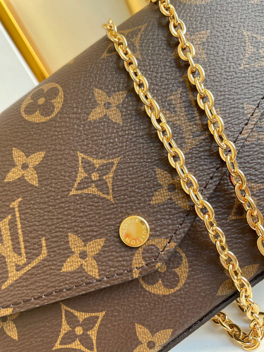 LOUIS VUITTON FÉLICIE POCHETTE 21 IN BROWN MONOGRAM CANVAS GOLD HARDWARE