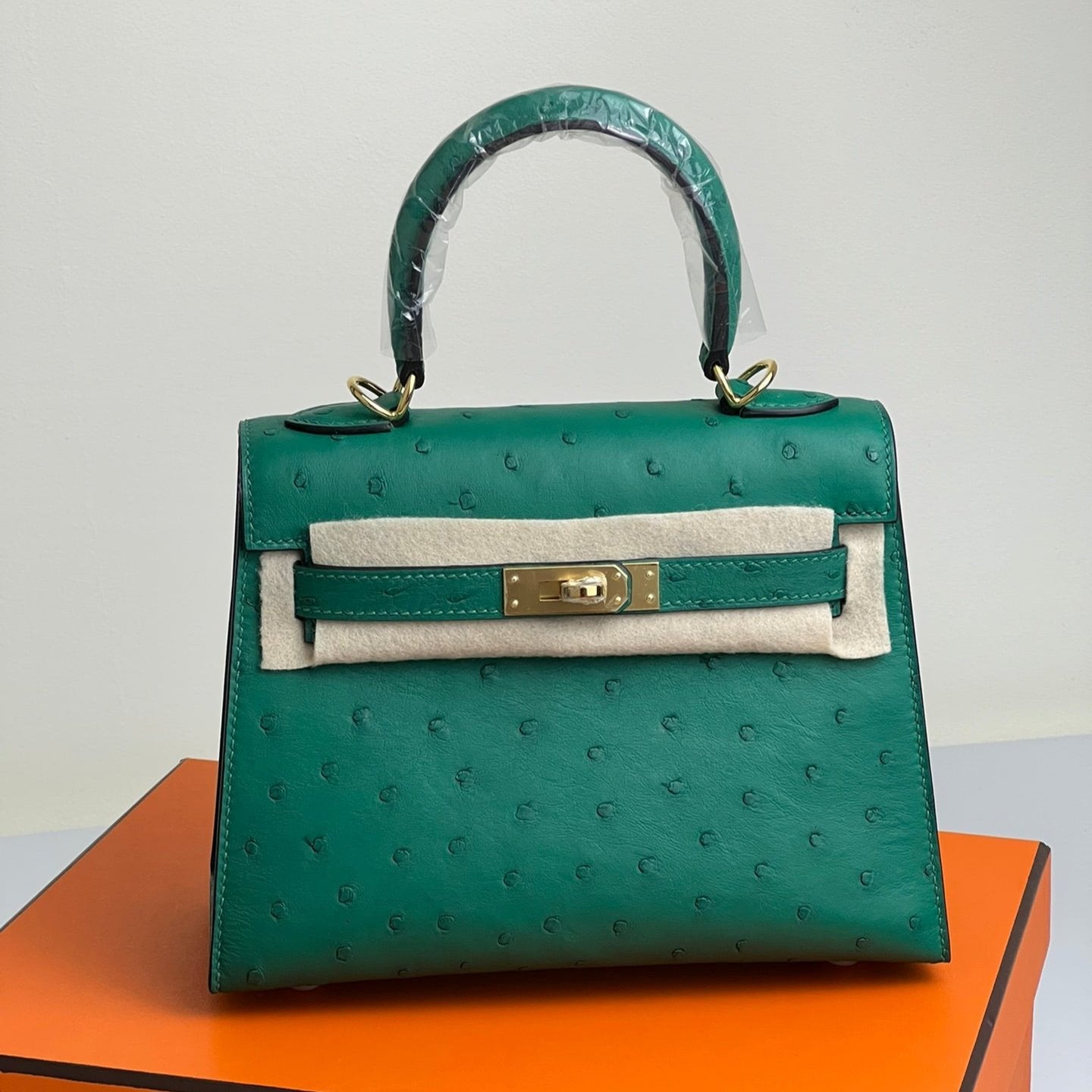 HERMES KELLY BAG 20 IN TEAL GREEN OSTRICH LEATHER WITH GOLD HARDWARE