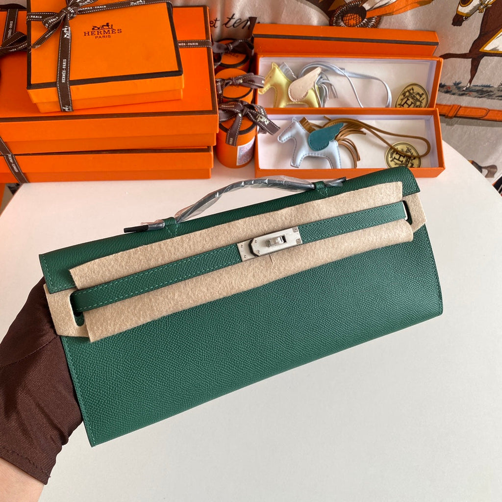 HERMES KELLY CUT 31 IN GREEN FOREST CALFSKIN WITH SILVER HARDWARE