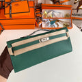 HERMES KELLY CUT 31 IN GREEN FOREST CALFSKIN WITH SILVER HARDWARE