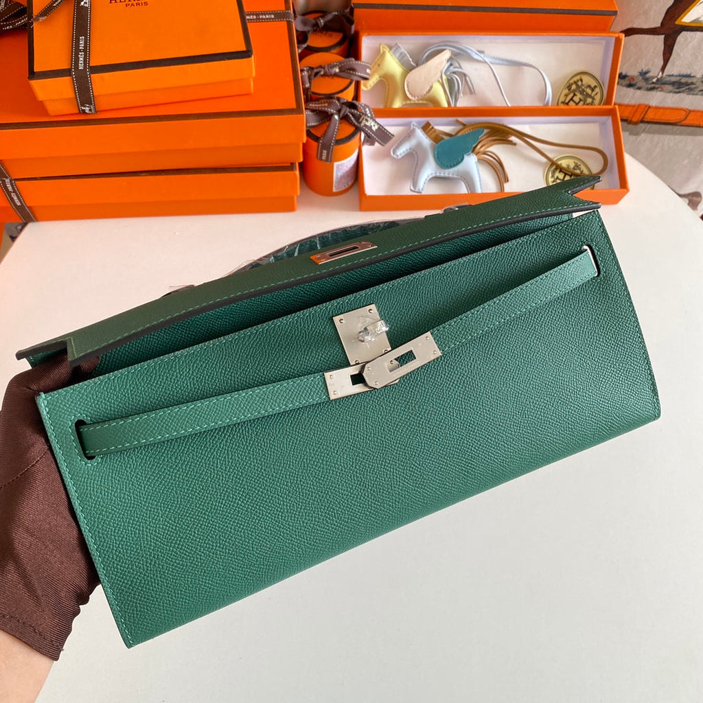 HERMES KELLY CUT 31 IN GREEN FOREST CALFSKIN WITH SILVER HARDWARE