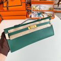 HERMES KELLY CUT 31 IN GREEN FOREST CALFSKIN WITH GOLD HARDWARE