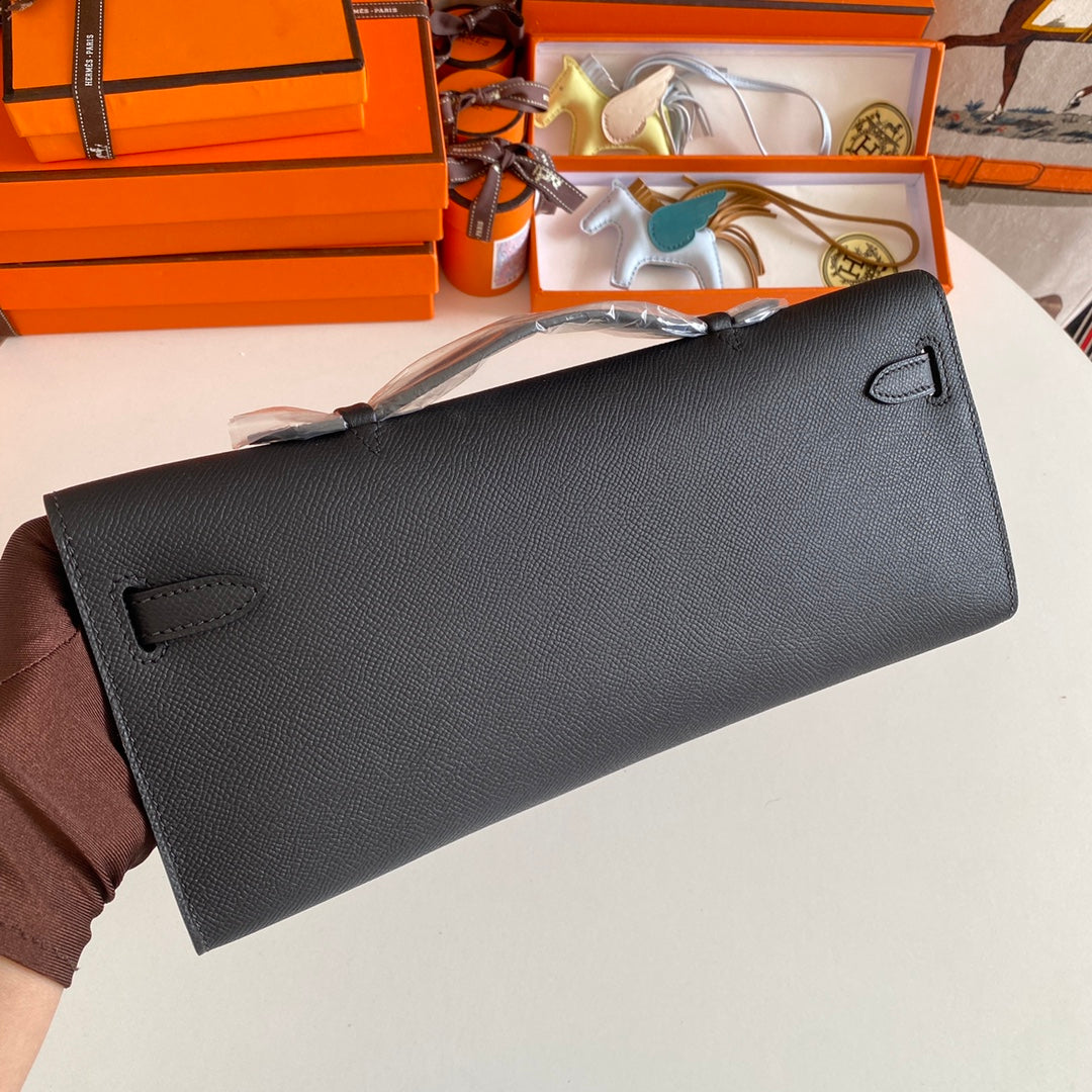 HERMES KELLY CUT 31 IN BLACK CALFSKIN WITH GOLD HARDWARE