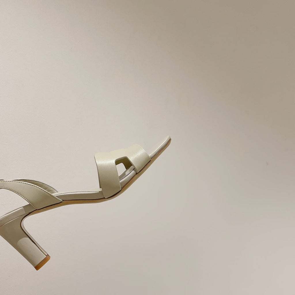 HERMES HOLY 75 SANDAL IN WHITE CREAM CALFSKIN