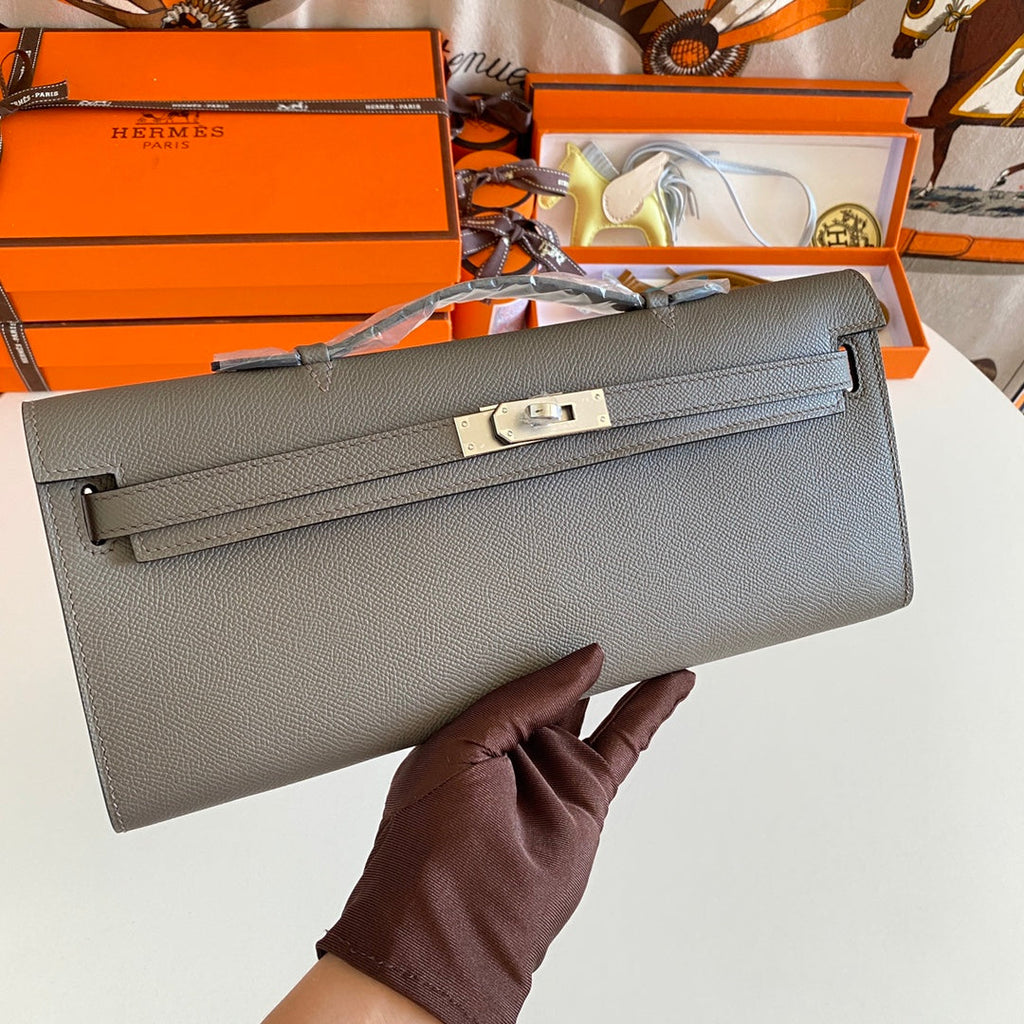 HERMES KELLY CUT 31 IN WOOD BROWN CALFSKIN WITH SILVER HARDWARE