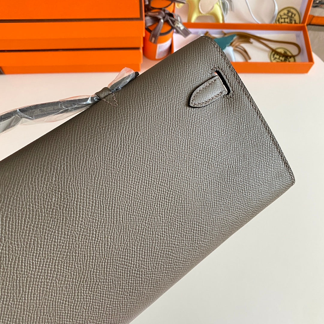 HERMES KELLY CUT 31 IN WOOD BROWN CALFSKIN WITH GOLD HARDWARE