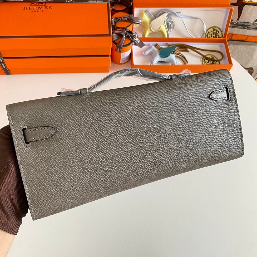 HERMES KELLY CUT 31 IN WOOD BROWN CALFSKIN WITH GOLD HARDWARE
