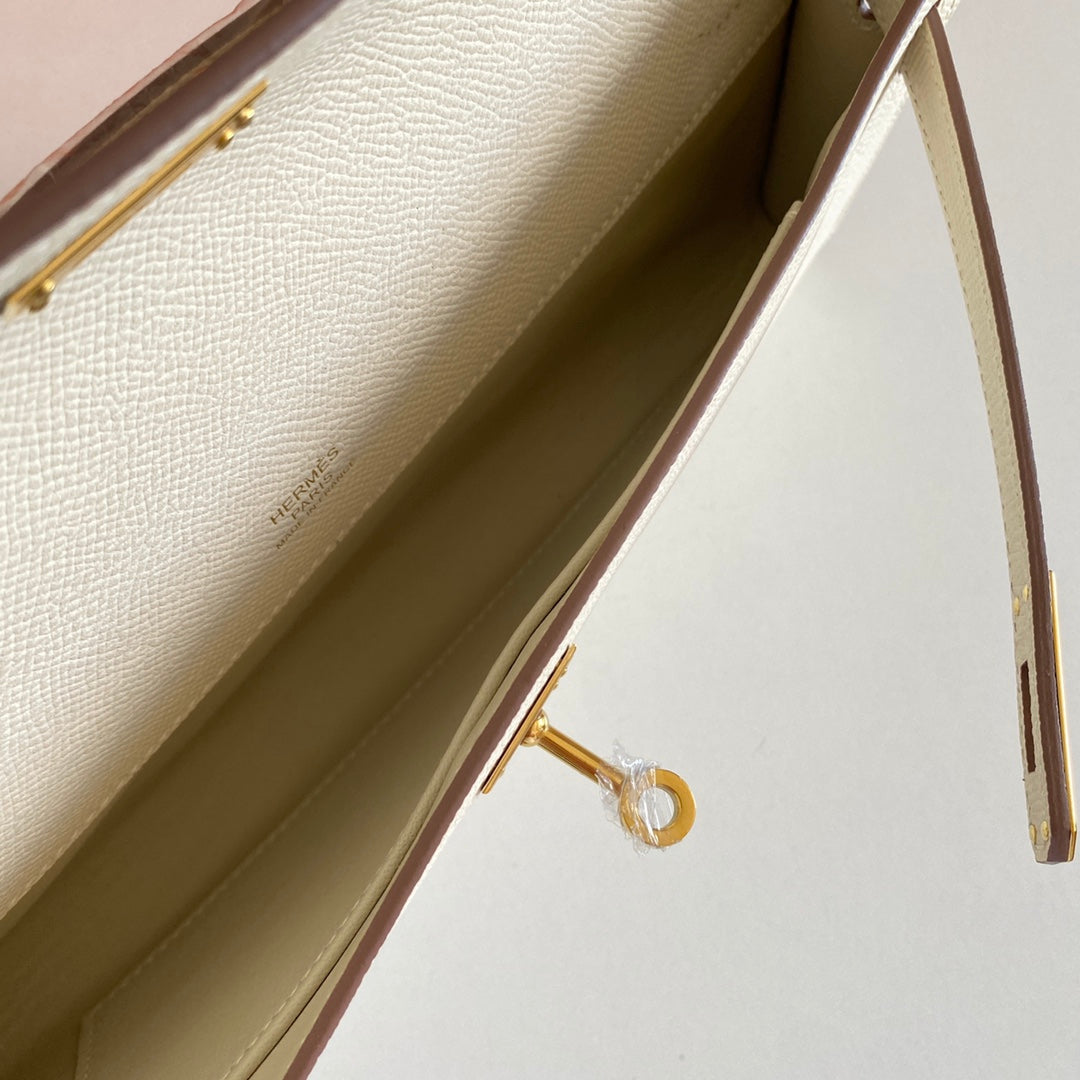HERMES KELLY CUT 31 IN BEIGE CREAM CALFSKIN WITH GOLD HARDWARE