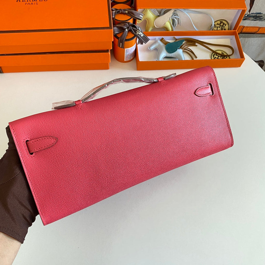 HERMES KELLY CUT 31 IN WATERMELON PINK CALFSKIN WITH GOLD HARDWARE