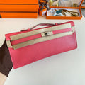 HERMES KELLY CUT 31 IN WATERMELON PINK CALFSKIN WITH SILVER HARDWARE