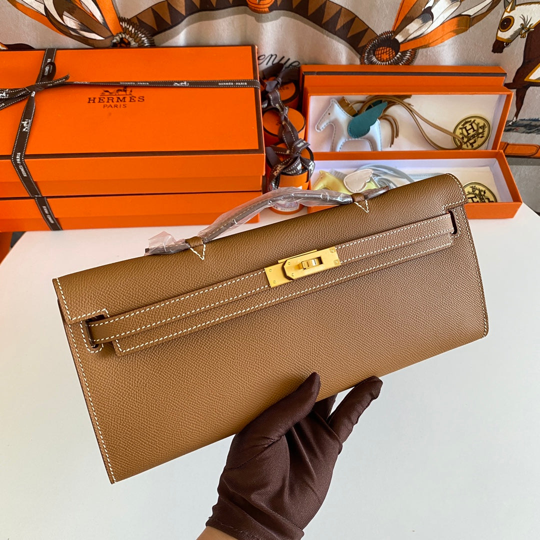 HERMES KELLY CUT 31 IN BRONZE BROWN CALFSKIN WITH GOLD HARDWARE