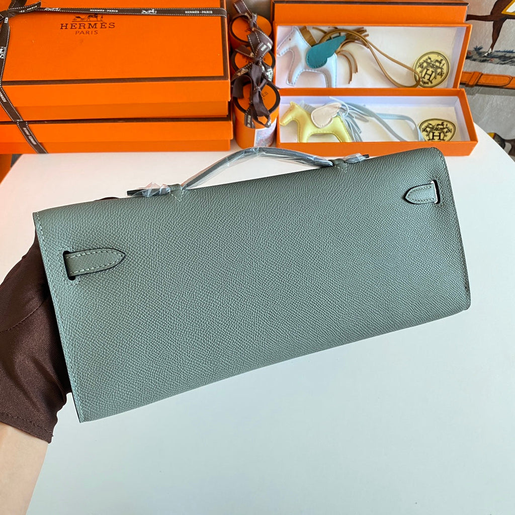 HERMES KELLY CUT 31 IN SEAFOAM GREEN CALFSKIN WITH SILVER HARDWARE