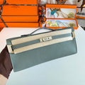 HERMES KELLY CUT 31 IN SEAFOAM GREEN CALFSKIN WITH SILVER HARDWARE