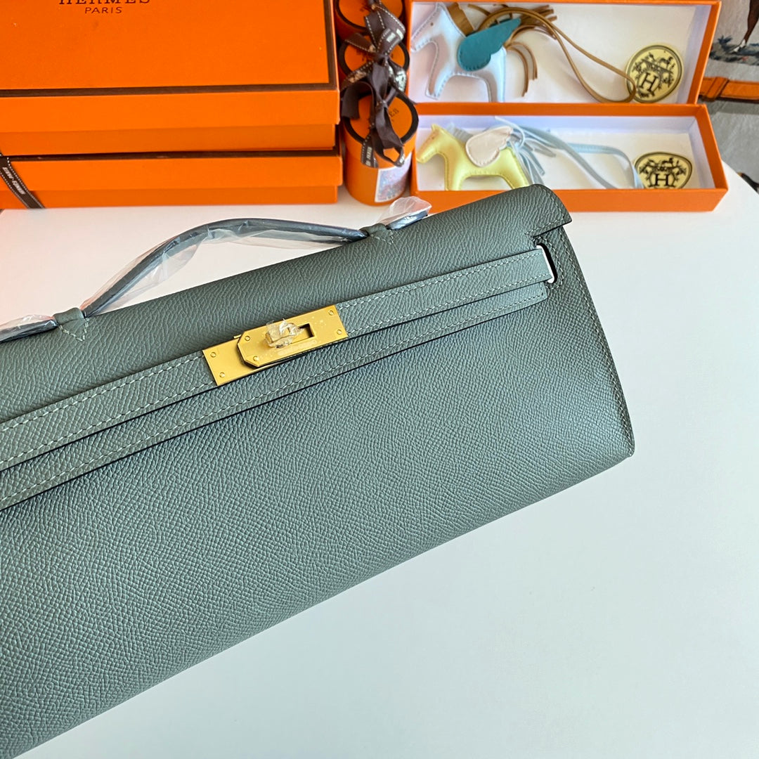 HERMES KELLY CUT 31 IN SEAFOAM GREEN CALFSKIN WITH GOLD HARDWARE