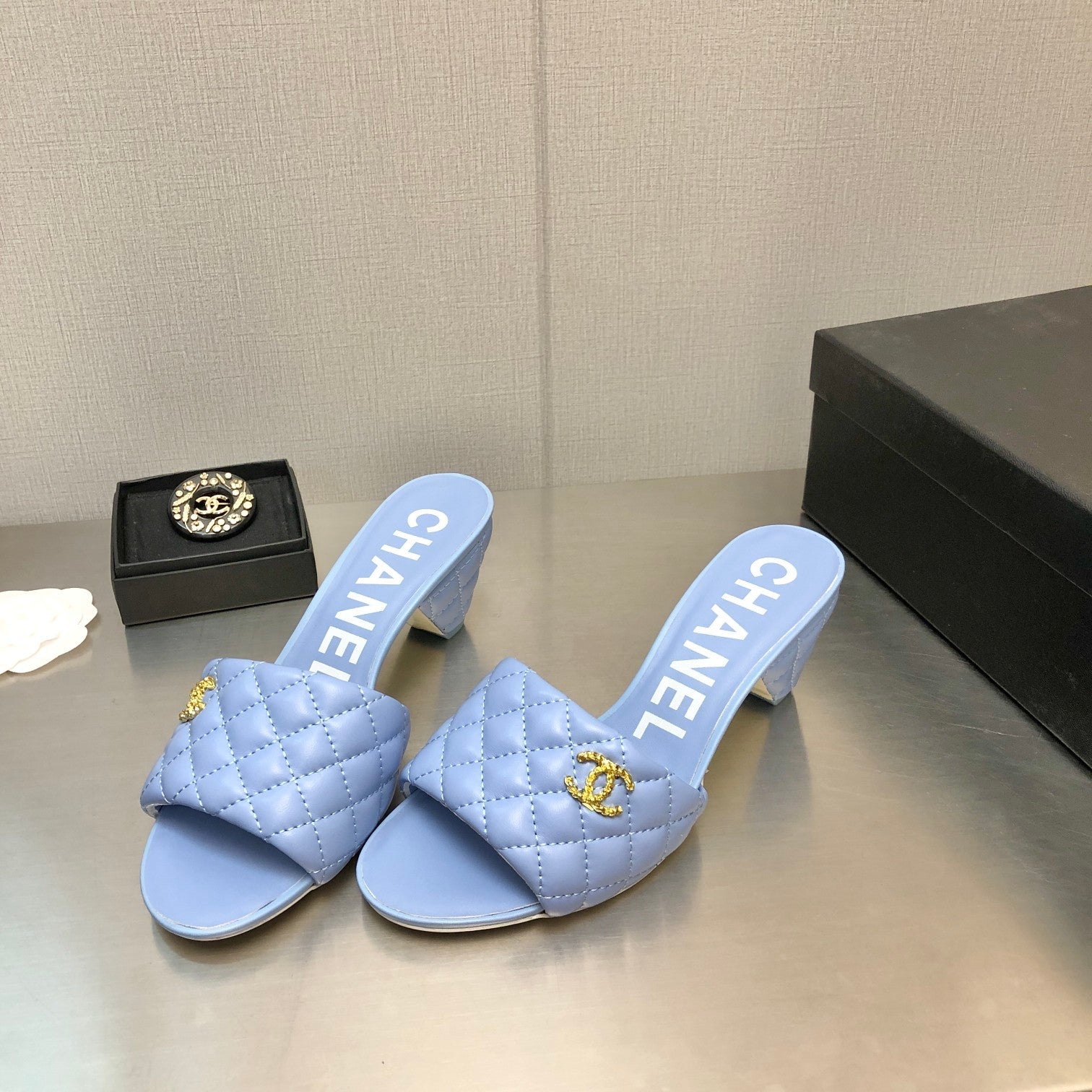 CHANEL DIAMOND-QUILTED 6 CM SANDALS IN CAROLINA BLUE LAMBSKIN