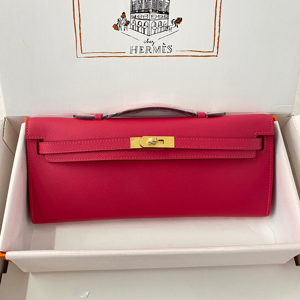 HERMES KELLY CUT 31 IN CHERRY RED CALFSKIN WITH GOLD HARDWARE