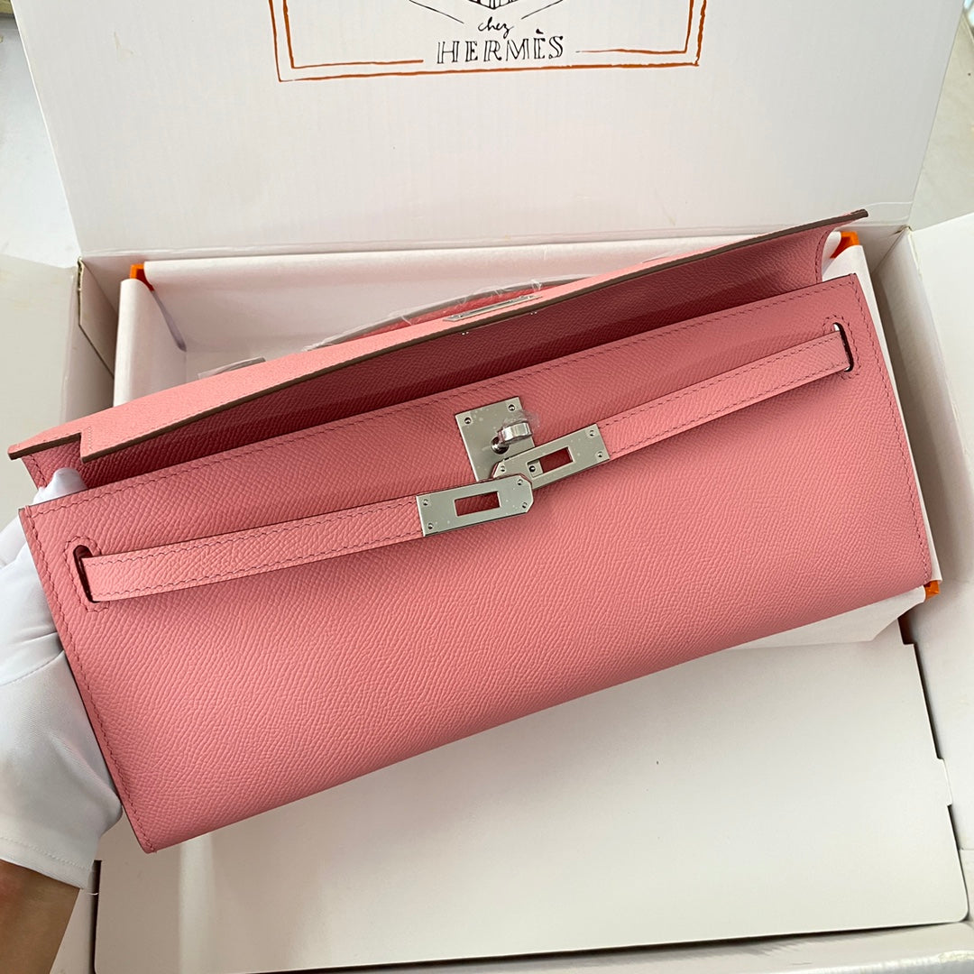 HERMES KELLY CUT 31 IN SALMON PINK CALFSKIN WITH SILVER HARDWARE