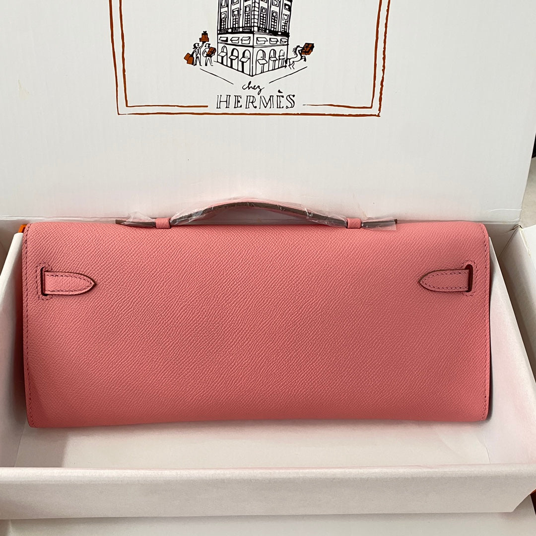 HERMES KELLY CUT 31 IN SALMON PINK CALFSKIN WITH SILVER HARDWARE