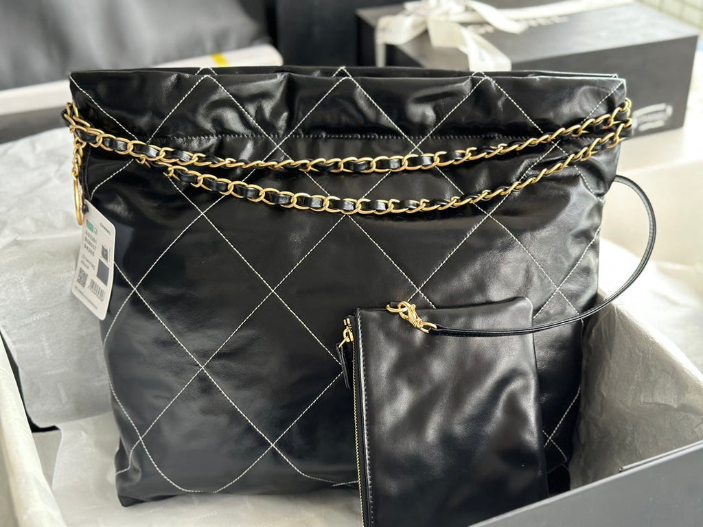 CHANEL LARGE 42 HANDBAG IN BLACK SHINY CALFSKIN GOLD HARDWARE