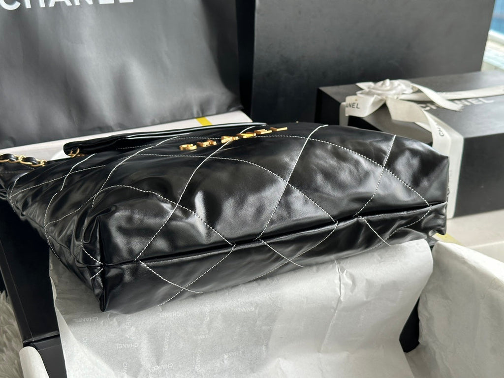 CHANEL LARGE 42 HANDBAG IN BLACK SHINY CALFSKIN GOLD HARDWARE